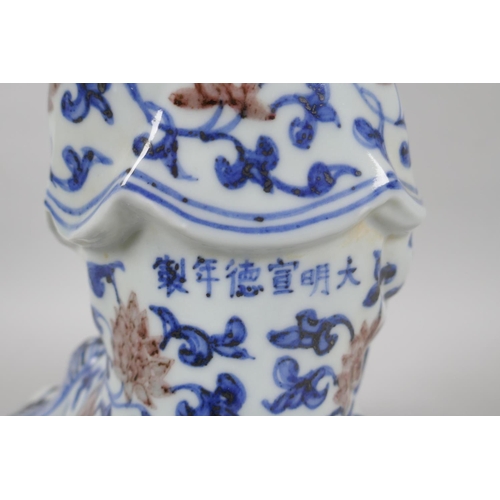 100 - A Chinese blue and white porcelain figure of Guanyin, Xuande 6 character mark to the reverse, 29cm h... 