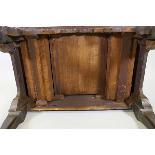 1001 - A Georgian walnut lowboy, the quarter veneered top with moulded edge and cut corners with herringbon... 