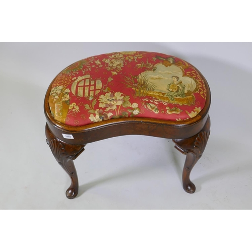 1002 - Georgian style walnut veneered kidney shaped foot stool, with drop in seat, raised on carved cabriol... 