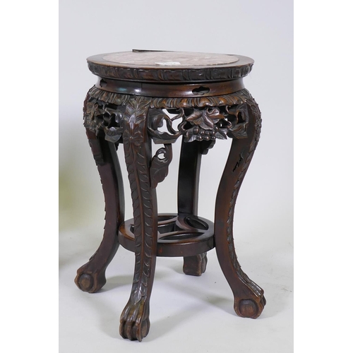 1004 - A pair of antique Chinese hardwood stands with inset rouge marble tops and carved and pierced frieze... 