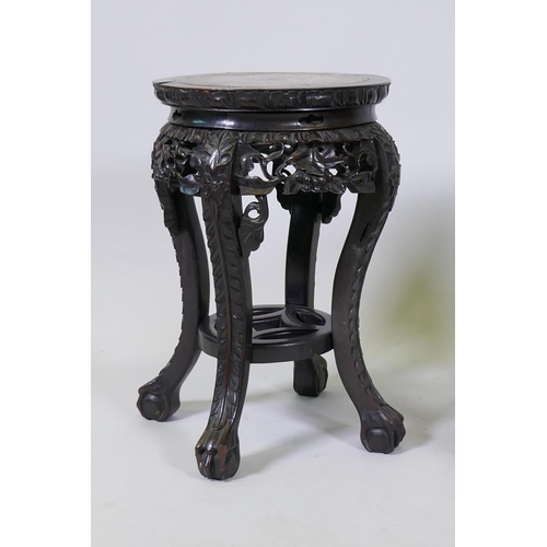 1004 - A pair of antique Chinese hardwood stands with inset rouge marble tops and carved and pierced frieze... 