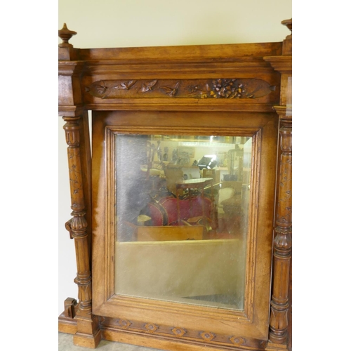 1009 - A C19th French walnut dressing table with swing mirror flanked by columns, grey marble top over a fr... 