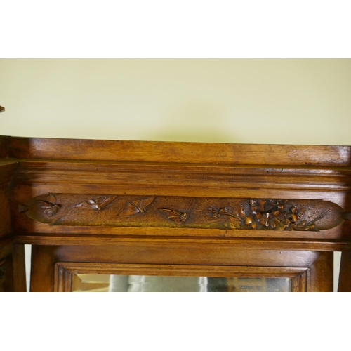 1009 - A C19th French walnut dressing table with swing mirror flanked by columns, grey marble top over a fr... 