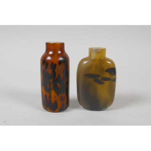 101 - A Chinese tortoise shell glass snuff bottle, and another, 7cm 