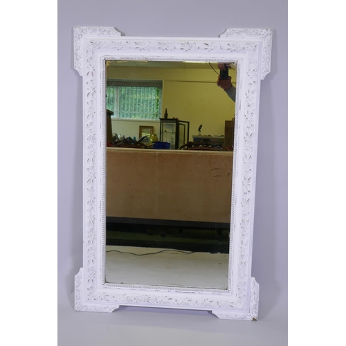 1011 - A late C19th French painted wall mirror with moulded decoration and original glass, 104 x 75cm