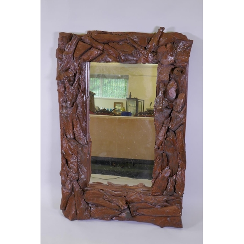 1012 - A painted driftwood frame wall mirror, 85 x 123cm