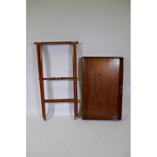 1017 - An antique mahogany butler's tray with folding stand, 78 x 49 x 9cm