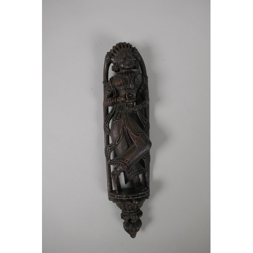 102 - An Indian carved wood figure, 27cm high