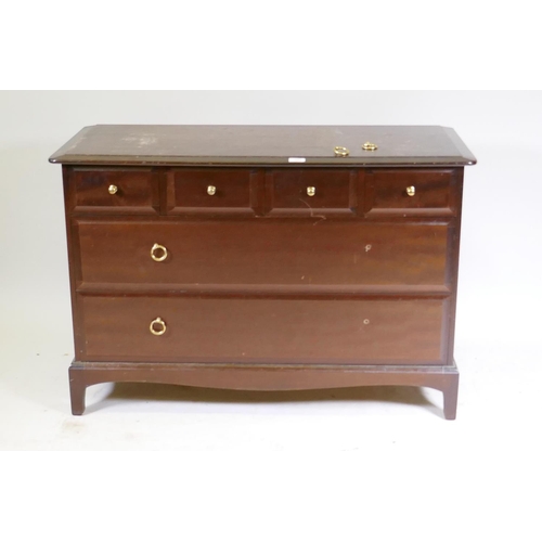 1022 - A Stag minstrel chest of four over two drawers, raised on square supports, 107 x 47 x 71cm