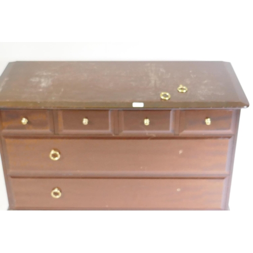 1022 - A Stag minstrel chest of four over two drawers, raised on square supports, 107 x 47 x 71cm