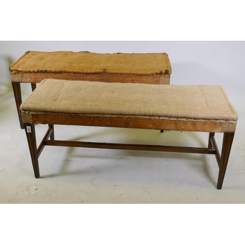 1023 - A pair of C19th oak country house window seats, raised on moulded tapering supports, united by H str... 