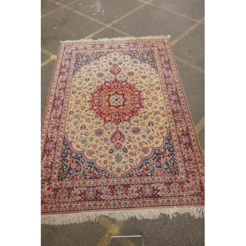 1025 - An English yellow ground hand knotted pile, country house carpet, probably Axminster, first half C20... 