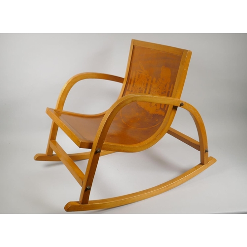 1036 - A mid century Bauhaus style child's birch bentwood rocking chair, 56cm long