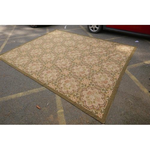 1046 - A Victorian beige and olive ground English needlepoint tapestry with floral design, 330 x 275cm