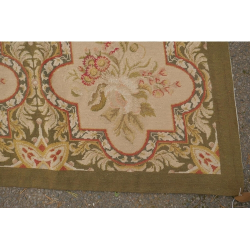 1046 - A Victorian beige and olive ground English needlepoint tapestry with floral design, 330 x 275cm