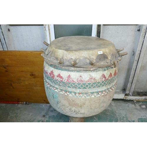 1051 - A large African Zambian carved and painted wood Tonga Budima goblet drum, 120cm high x 75cm diameter