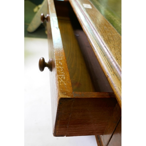 1052 - Victorian oak veneered nine drawer pedestal desk with gilt tooled leather inset top, 122 x 60 x 72cm