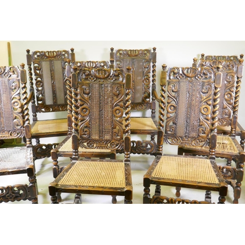 1055 - A set of two plus six walnut William and Mary style chairs with carved and pierced backs flanked by ... 