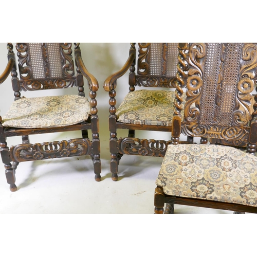 1055 - A set of two plus six walnut William and Mary style chairs with carved and pierced backs flanked by ... 