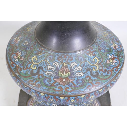 1057 - An oriental bronze and cloisonne lamp base, 59cm high