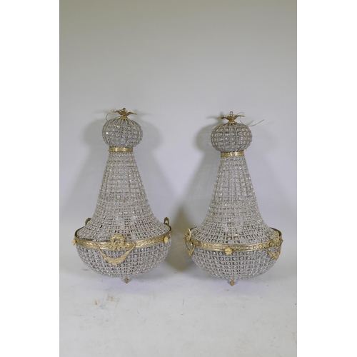 1061 - A pair of empire style pendant ceiling lights, 95cm drop