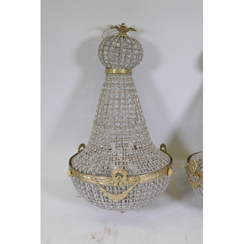 1061 - A pair of empire style pendant ceiling lights, 95cm drop