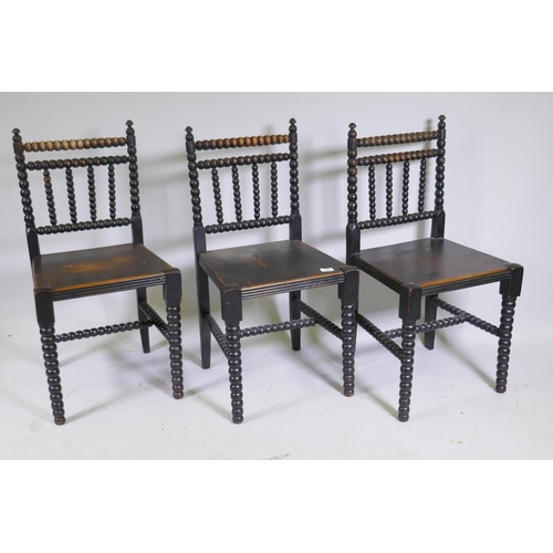 1064 - A set of three C19th bobbin turned side chairs