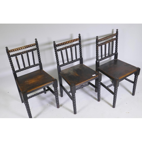 1064 - A set of three C19th bobbin turned side chairs