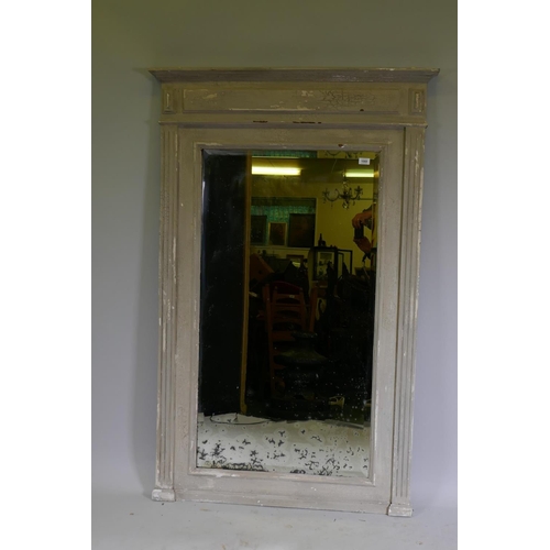 1068 - A C19th French wall mirror with distressed painted frame and antique bevelled edge glass, 104 x 160c... 