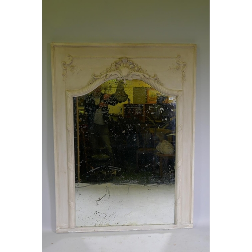 1073 - C19th French trumeau wall mirror with moulded decoration and distressed paint, and inset antique gla... 