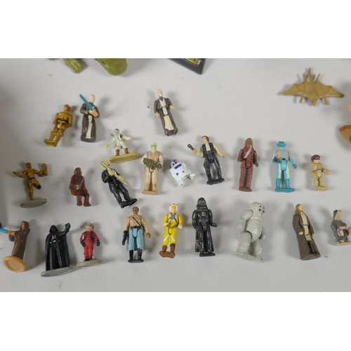 109 - A quantity of 90s Star Wars Micro Machines play sets and vehicles, to include the Millenium Falcon, ... 