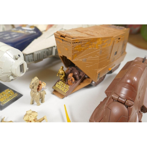 109 - A quantity of 90s Star Wars Micro Machines play sets and vehicles, to include the Millenium Falcon, ... 