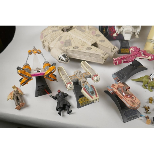 109 - A quantity of 90s Star Wars Micro Machines play sets and vehicles, to include the Millenium Falcon, ... 