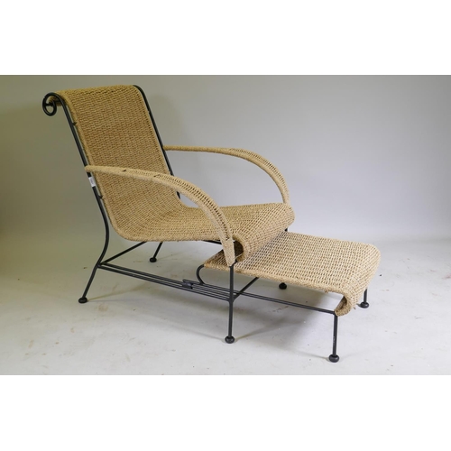 1091 - A contemporary sea grass open arm easy chair on a metal frame, with pull out foot stool