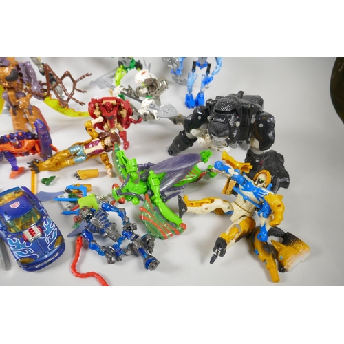 110 - A collection of Hasbro Transformers Beast Wars Biocombat action figures, with instructions, and a co... 