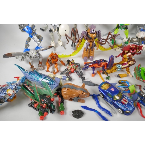 110 - A collection of Hasbro Transformers Beast Wars Biocombat action figures, with instructions, and a co... 