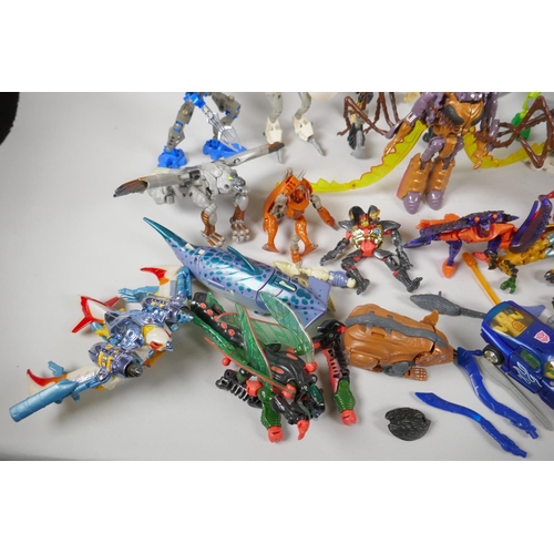 110 - A collection of Hasbro Transformers Beast Wars Biocombat action figures, with instructions, and a co... 