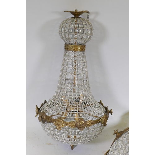 1106 - A pair of gilt metal and Empire style pendant ceiling lamps, 40cm diameter, 79cm high