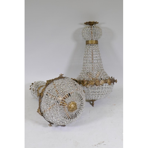 1111 - A pair of gilt metal and Empire style pendant ceiling lamps, 40cm diameter, 79cm high