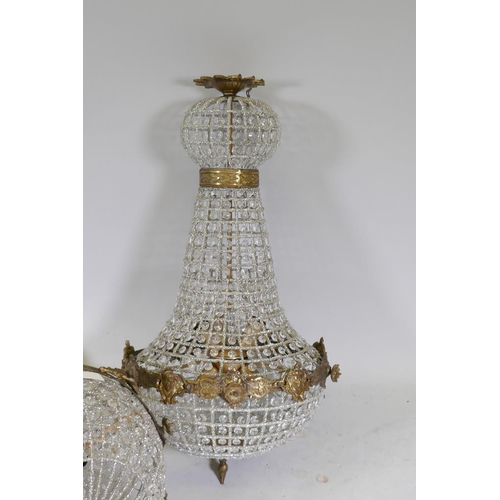 1111 - A pair of gilt metal and Empire style pendant ceiling lamps, 40cm diameter, 79cm high