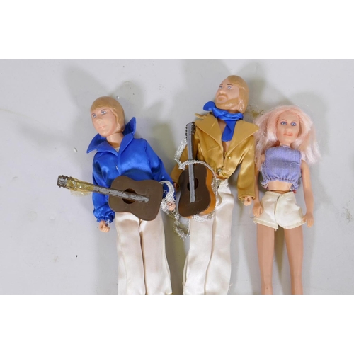 113 - A collection of vintage dolls, Barbie, Cindy, Matchbox Disco-Girls, Abba, various accessories and cl... 