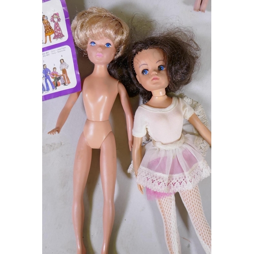 113 - A collection of vintage dolls, Barbie, Cindy, Matchbox Disco-Girls, Abba, various accessories and cl... 