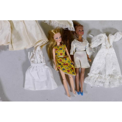 113 - A collection of vintage dolls, Barbie, Cindy, Matchbox Disco-Girls, Abba, various accessories and cl... 