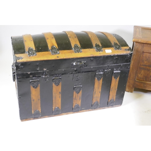 1136 - A Victorian dome top carriage trunk with wood straps and metal mounts, a coffer and a 1930s nursing ... 