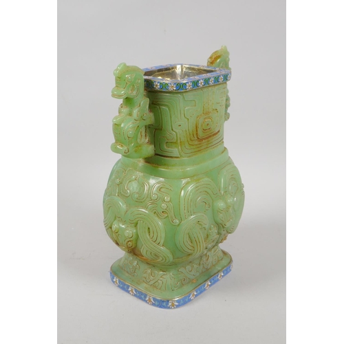 122 - A Chinese reconstituted green hardstone two handled vase with archaic style decoration, with Russian... 