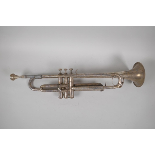 124 - A silver plated trumpet retailed by the King Instrument Co Ltd, London, stamped with a signature and... 