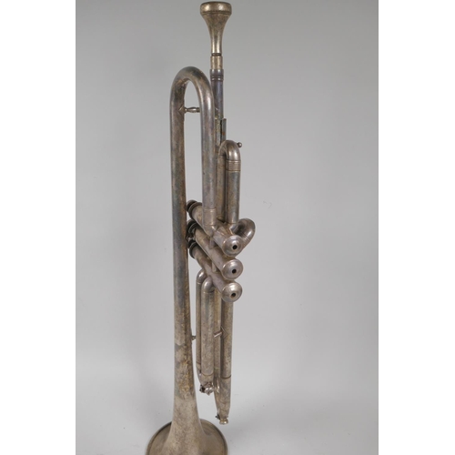 124 - A silver plated trumpet retailed by the King Instrument Co Ltd, London, stamped with a signature and... 