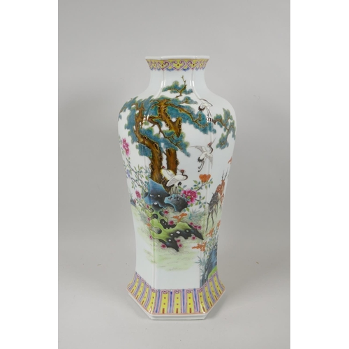 125 - A Chinese famille verte porcelain vase of hexagonal form decorated with cranes and deer in a landsca... 