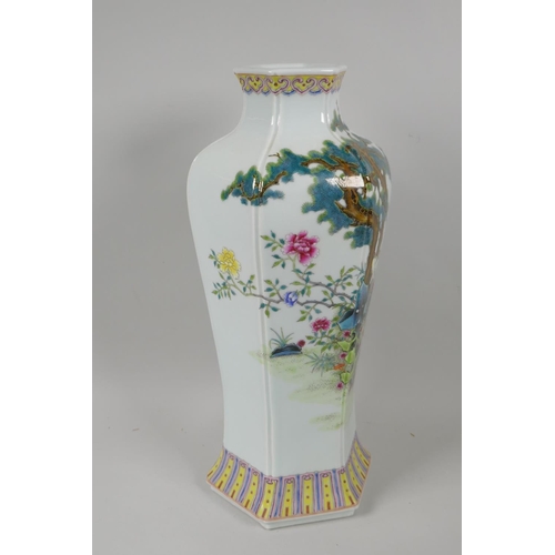 125 - A Chinese famille verte porcelain vase of hexagonal form decorated with cranes and deer in a landsca... 