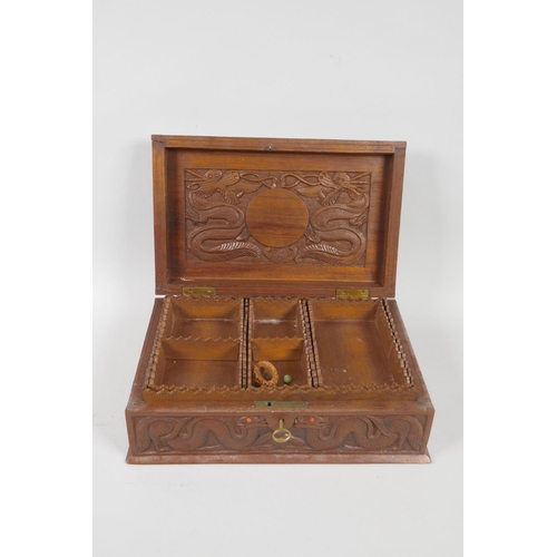 129 - An antique Burmese carved camphor wood jewellery box with entwined dragon decoration, and another sm... 